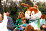 [PHOTO: The First Couple greeting the crowd at the Easter Egg Roll 
on the South Lawn]