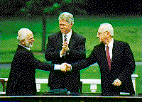 President Clinton with King Huseein and Prime 
Minister Rabin