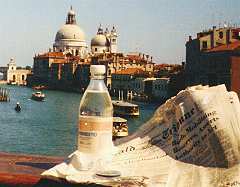 Enjoying the view with the International Herald Tribune in Venice.