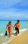 Couple emerging from Snorkeling on St. Croix Beach.